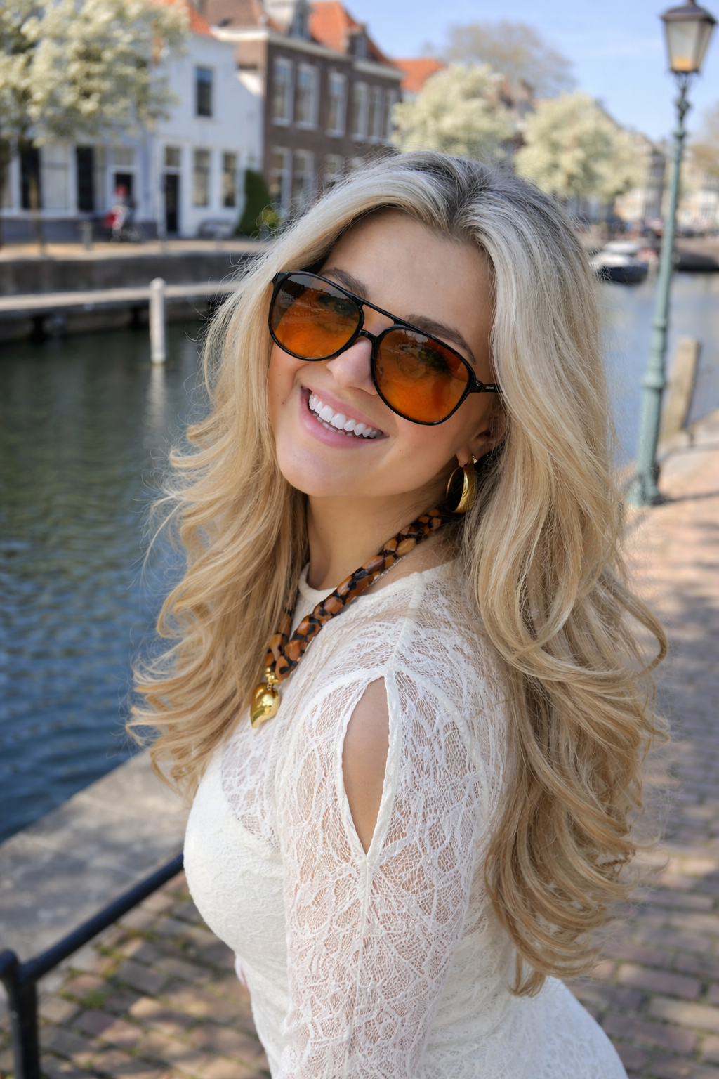  Women's plastic sunglasses with orange lenses and full-frame design on white background