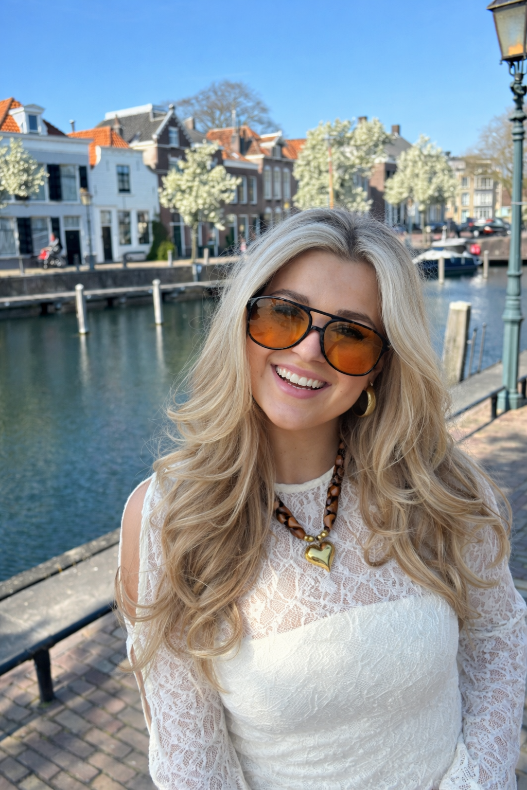  Lightweight orange lens women's sunglasses – front view showing plastic frame construction