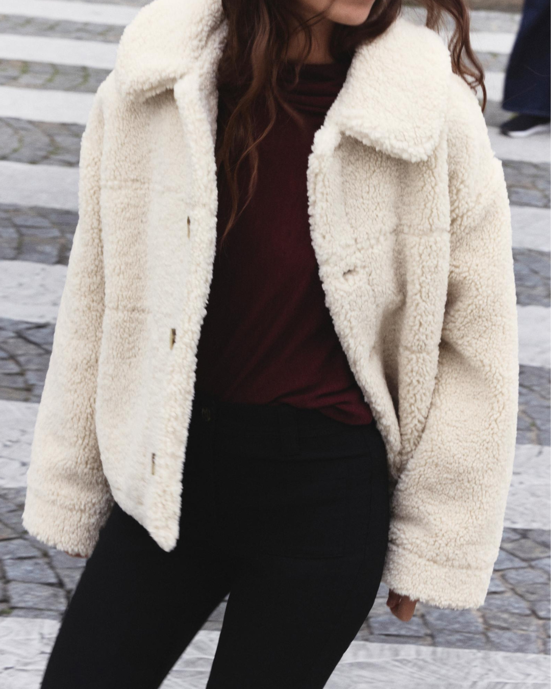 plush winter jacket with standing collar detail close up