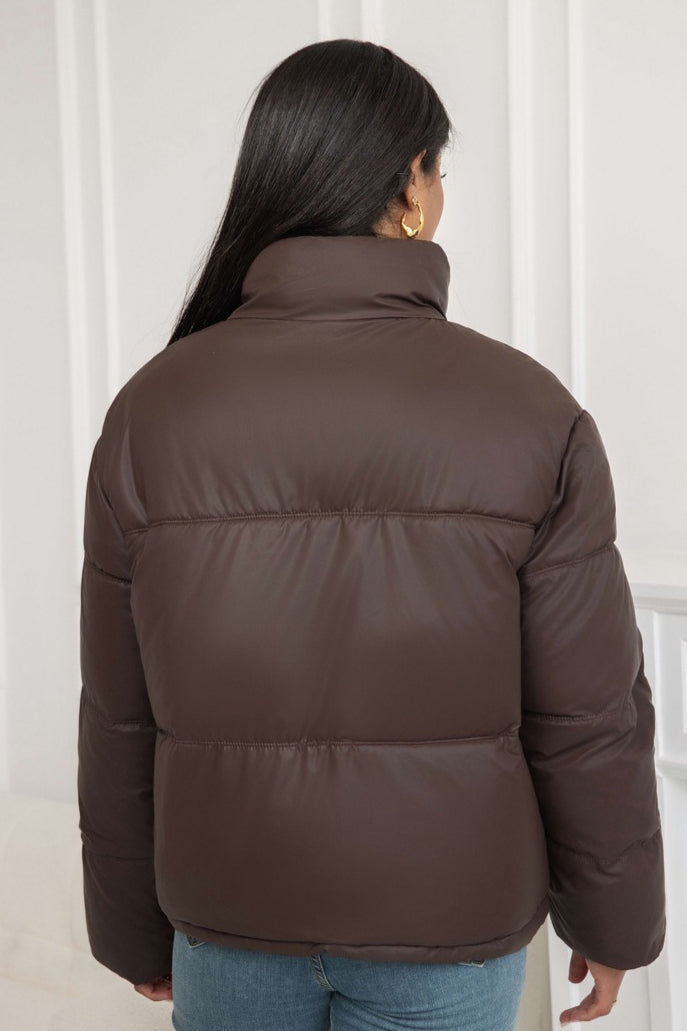 Insulated jacket with snap button closure and relaxed fit

