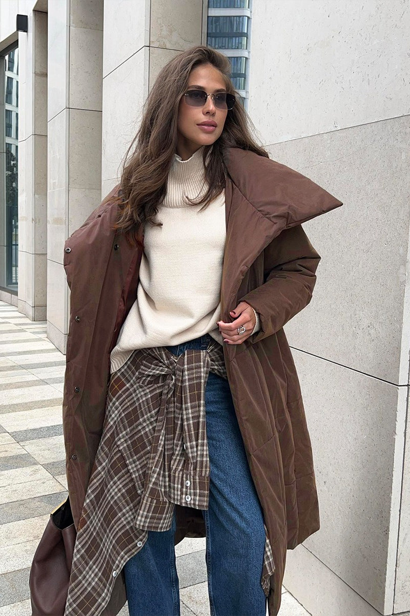 Polyester puffer jacket with high collar and relaxed silhouette for women