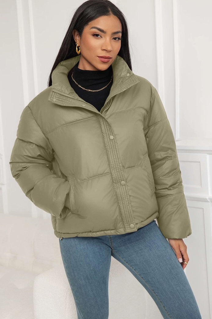 Padded jacket showing sleeve detail with ribbed cuffs
