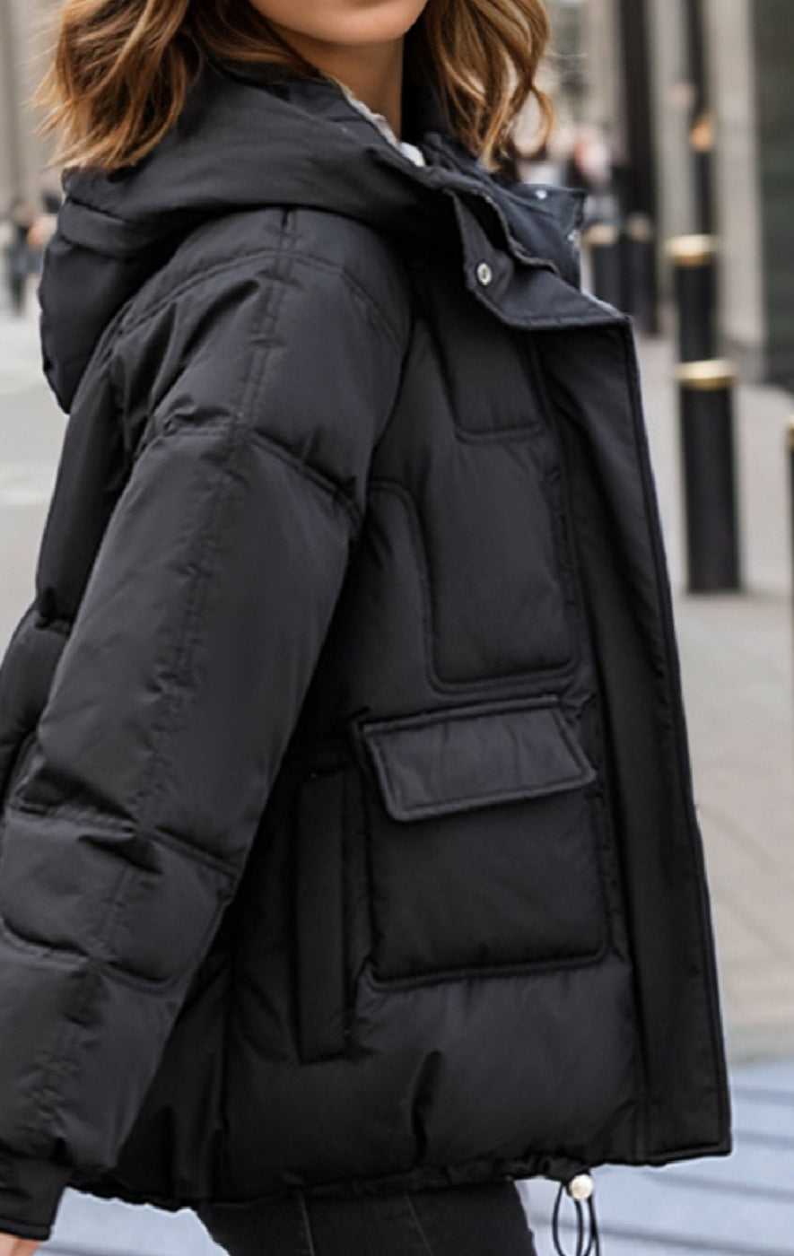 Polyester puffer jacket with stand collar in relaxed oversized fit for women
