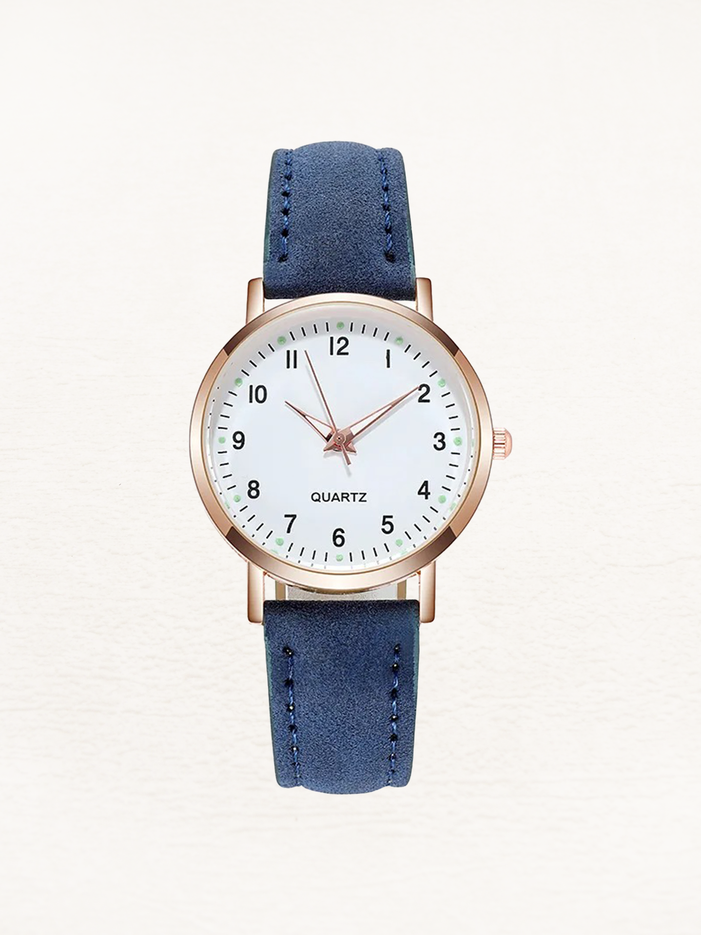 Women's analogue watch showcasing the polished metal case