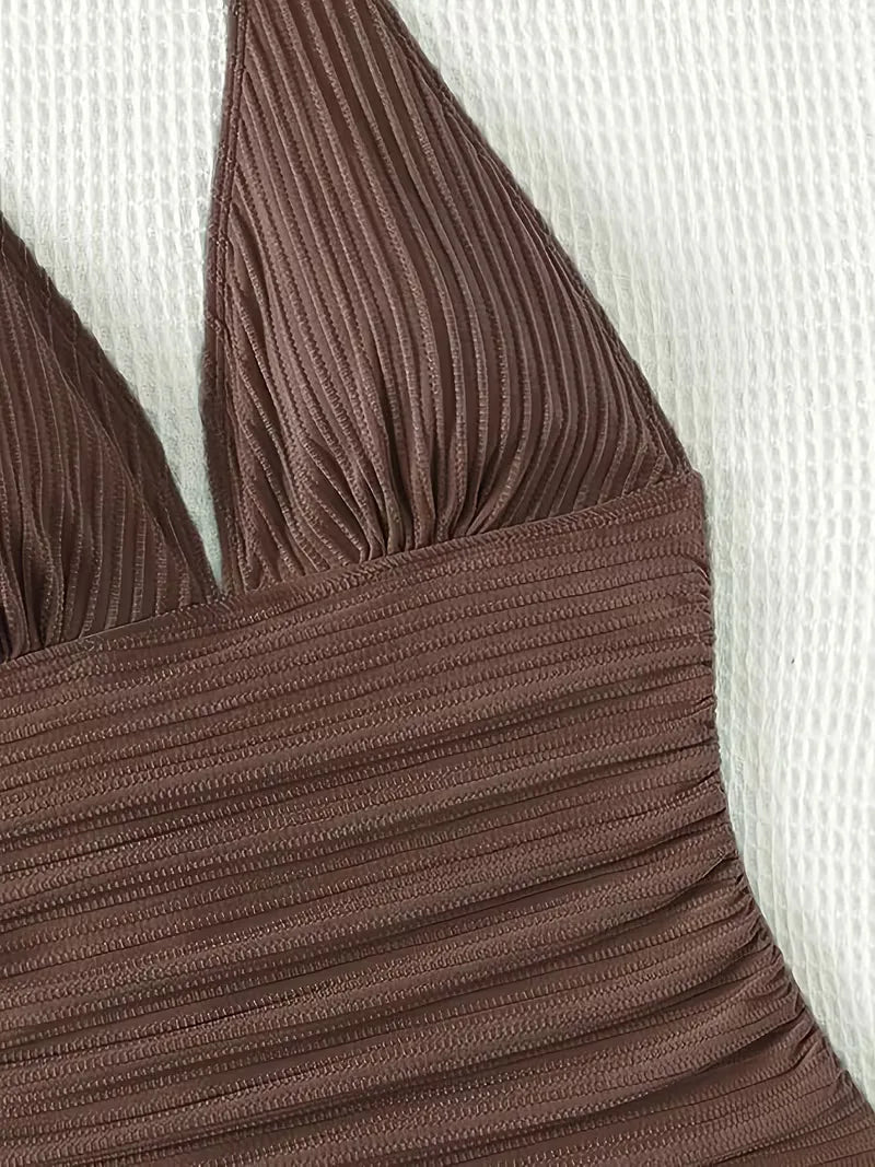 Women's ribbed swimsuit showcasing the fitted silhouette