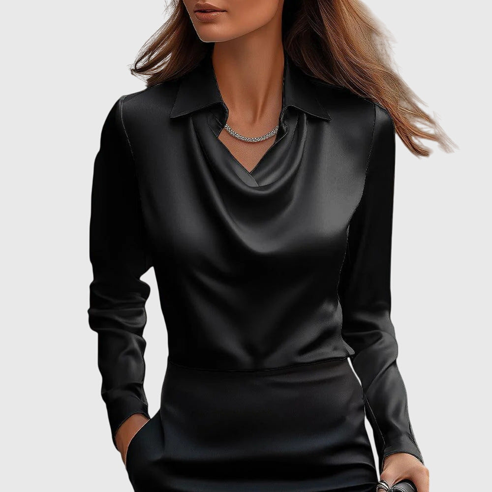 Satin blouse with cowl neck and tailored sleeves worn by woman

