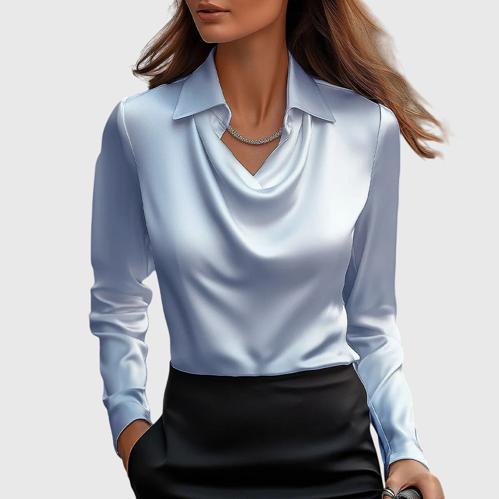 Satin blouse showing drape neckline detail and smooth fabric finish
