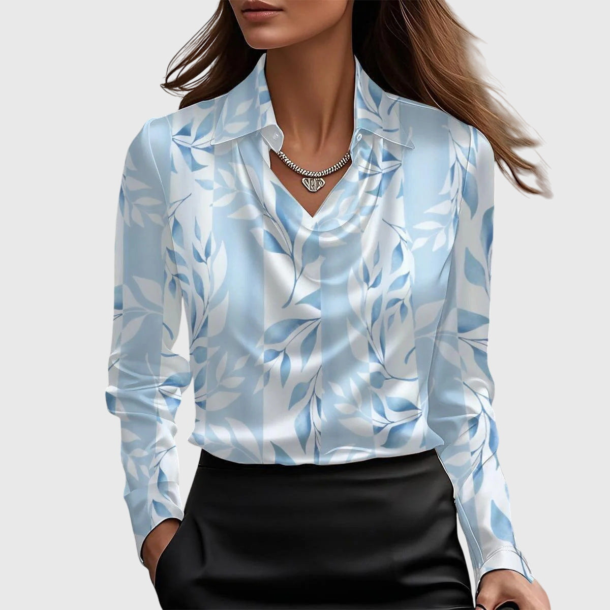 Satin blouse with pullover style and elegant drape worn casually
