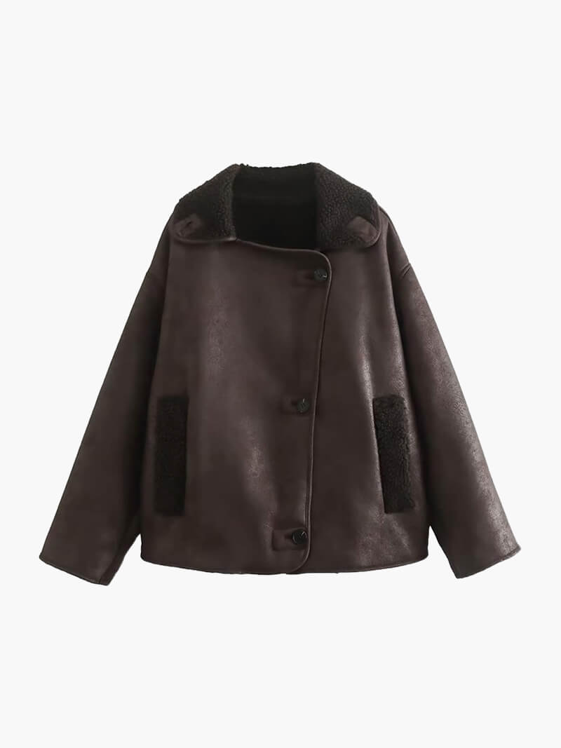faux leather jacket with relaxed fit shown from side angle
