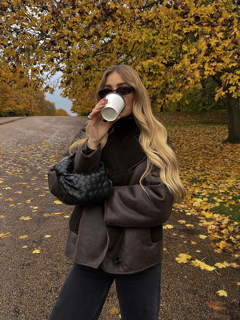 faux leather jacket back view showing relaxed drape

