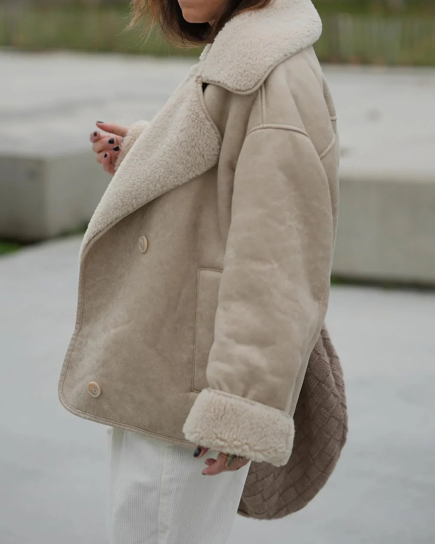 shearling lined jacket showing interior fleece texture
