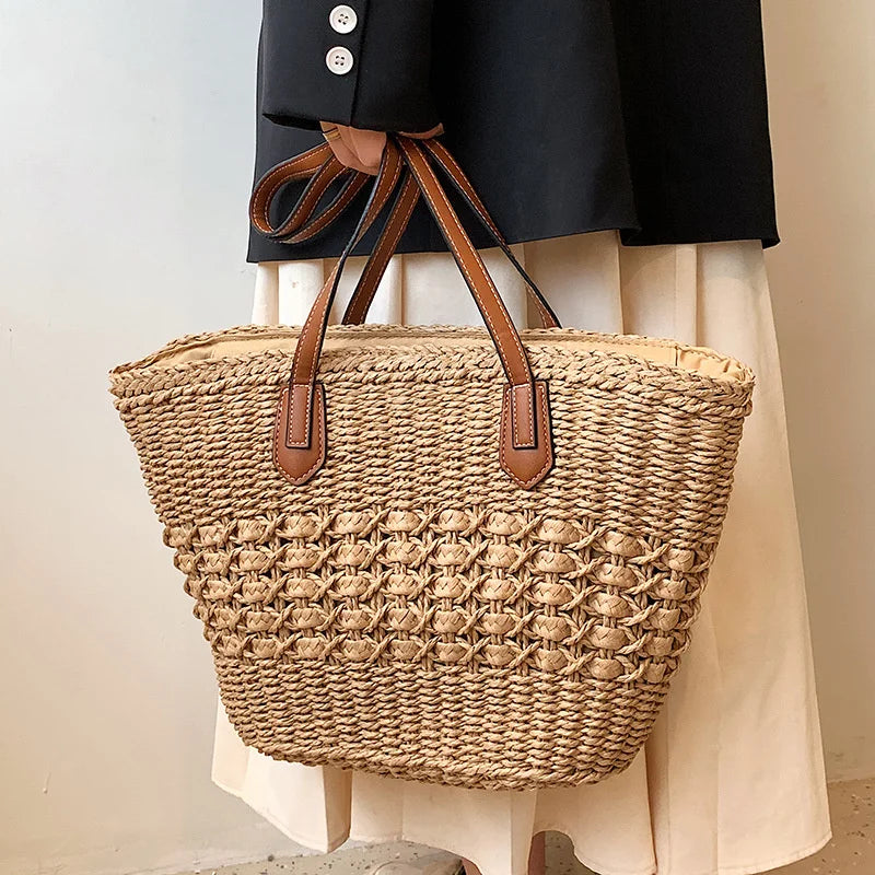 Women's cotton woven shoulder bag in beige showing shoulder strap detail
