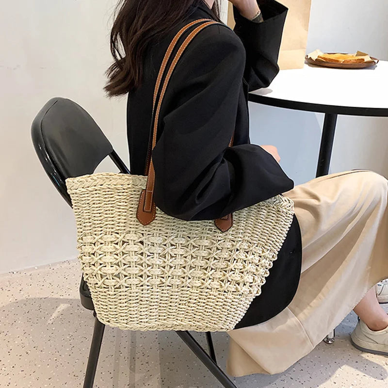Close-up of woven texture detail on women's cotton shoulder bag in beige