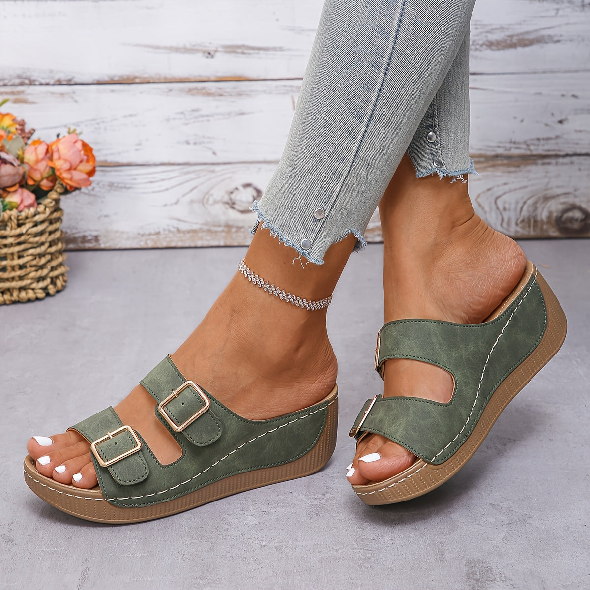 Women's Boston-style slip-on sandal in a full product view showing the closed-toe upper and adjustable buckle strap