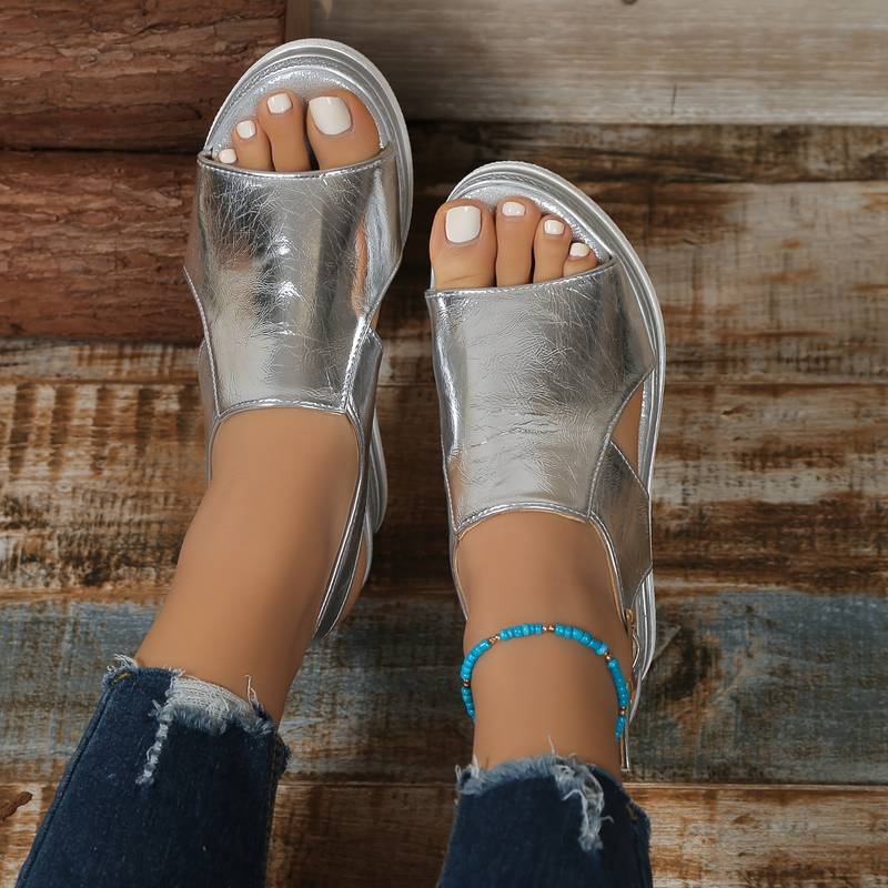Women's slip-on platform wedge sandals styled for casual warm-weather wear