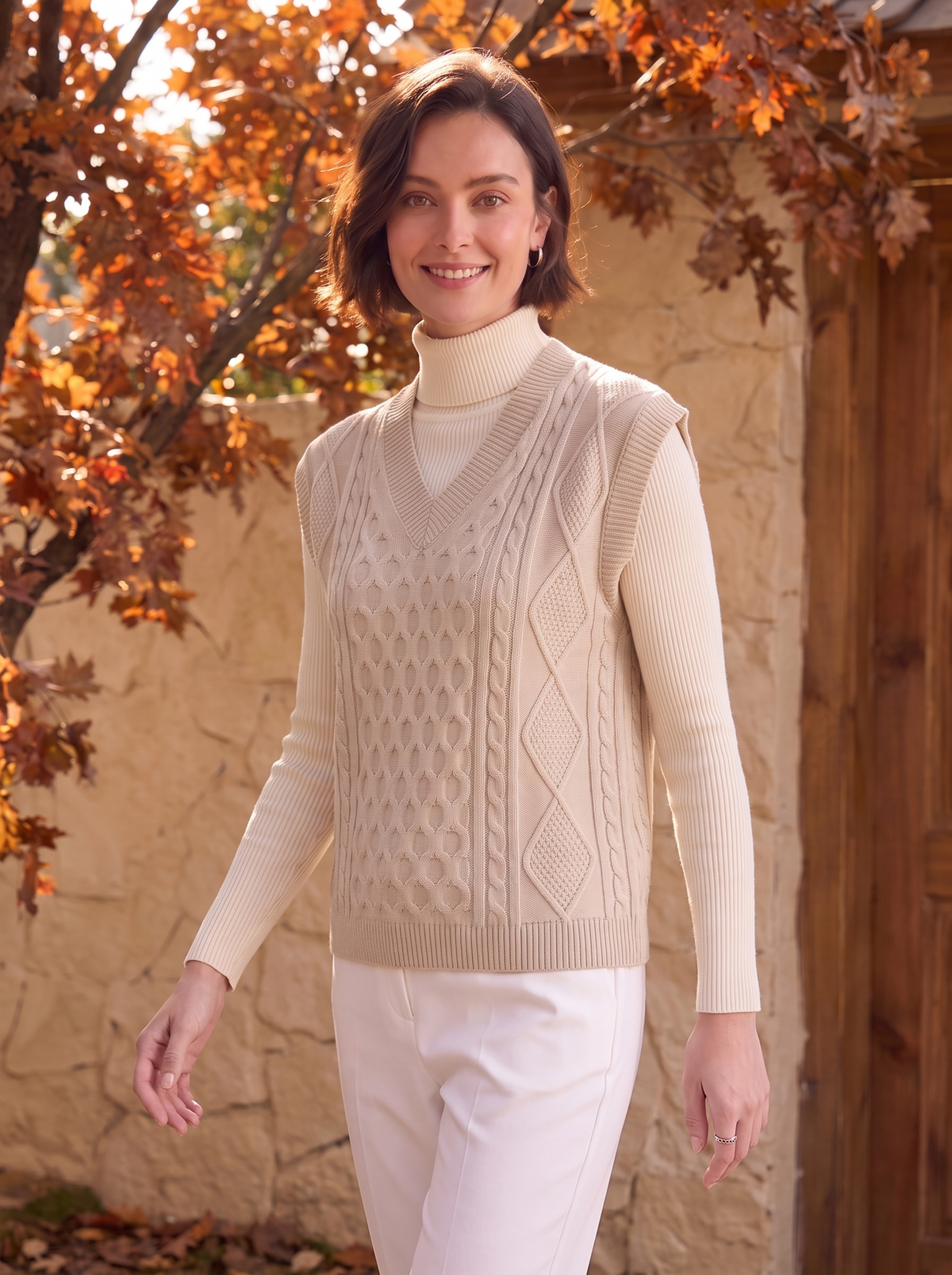 Women's sleeveless cable knit jumper