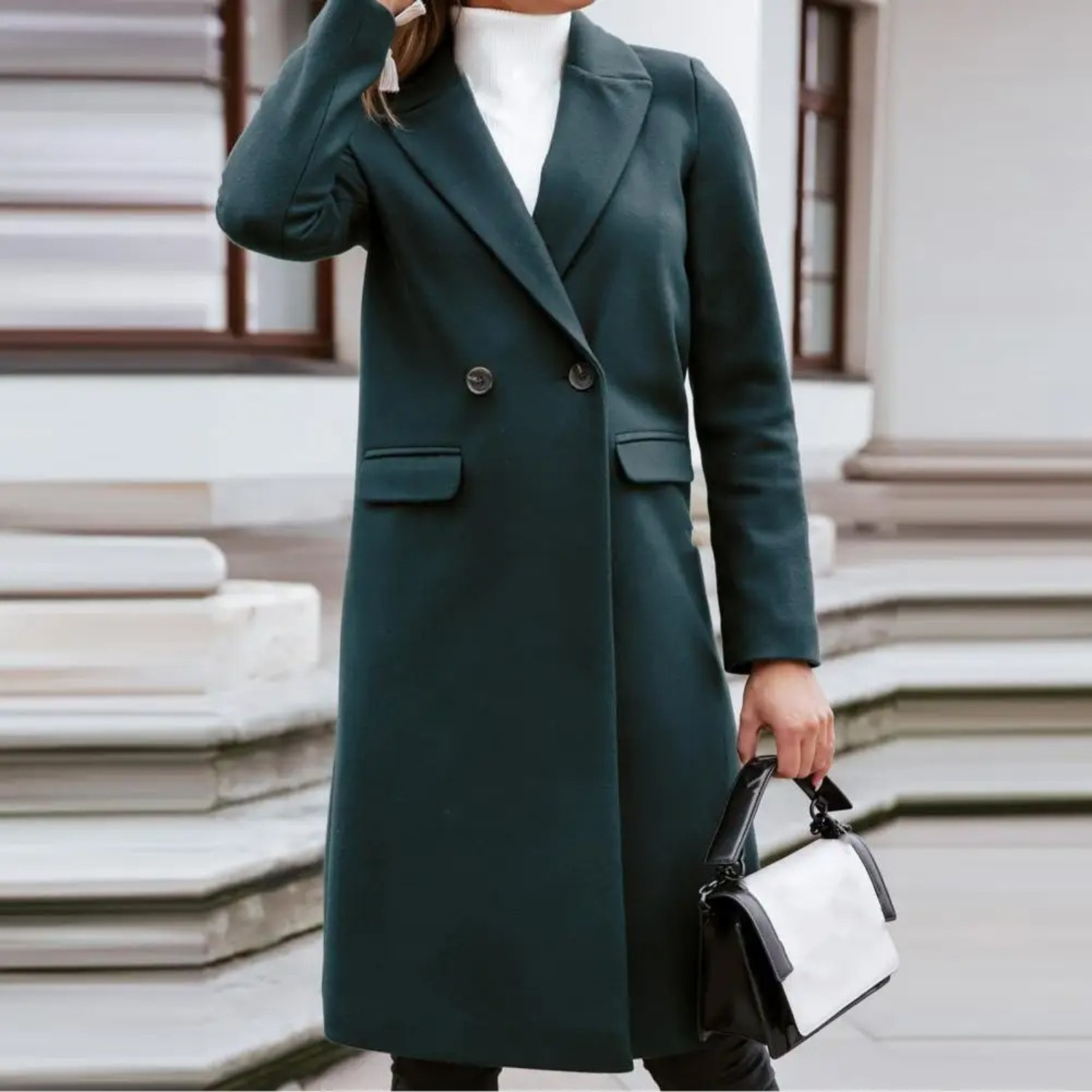 double breasted wool coat with notched collar detail closeup showing button placement