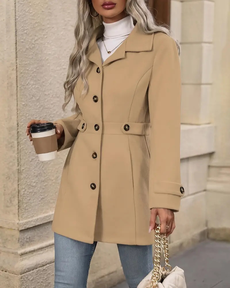 Wool coat side profile highlighting tailored waist and sleeve cut for women

