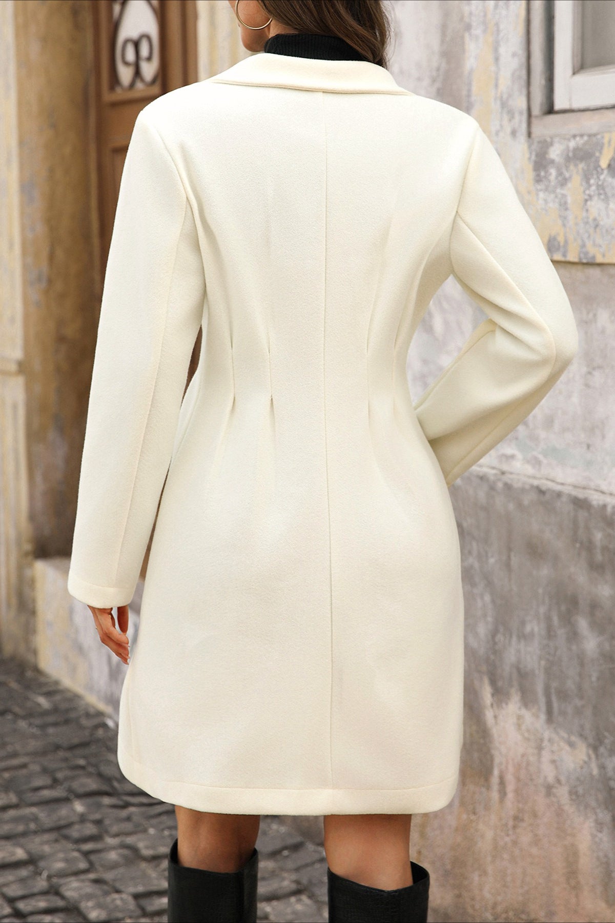 Wool coat with structured shoulders and clean lines for men

