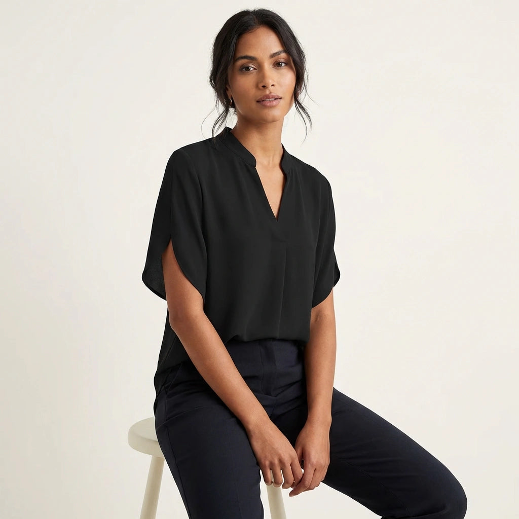 Women's blouse featuring a V-neckline and short sleeves