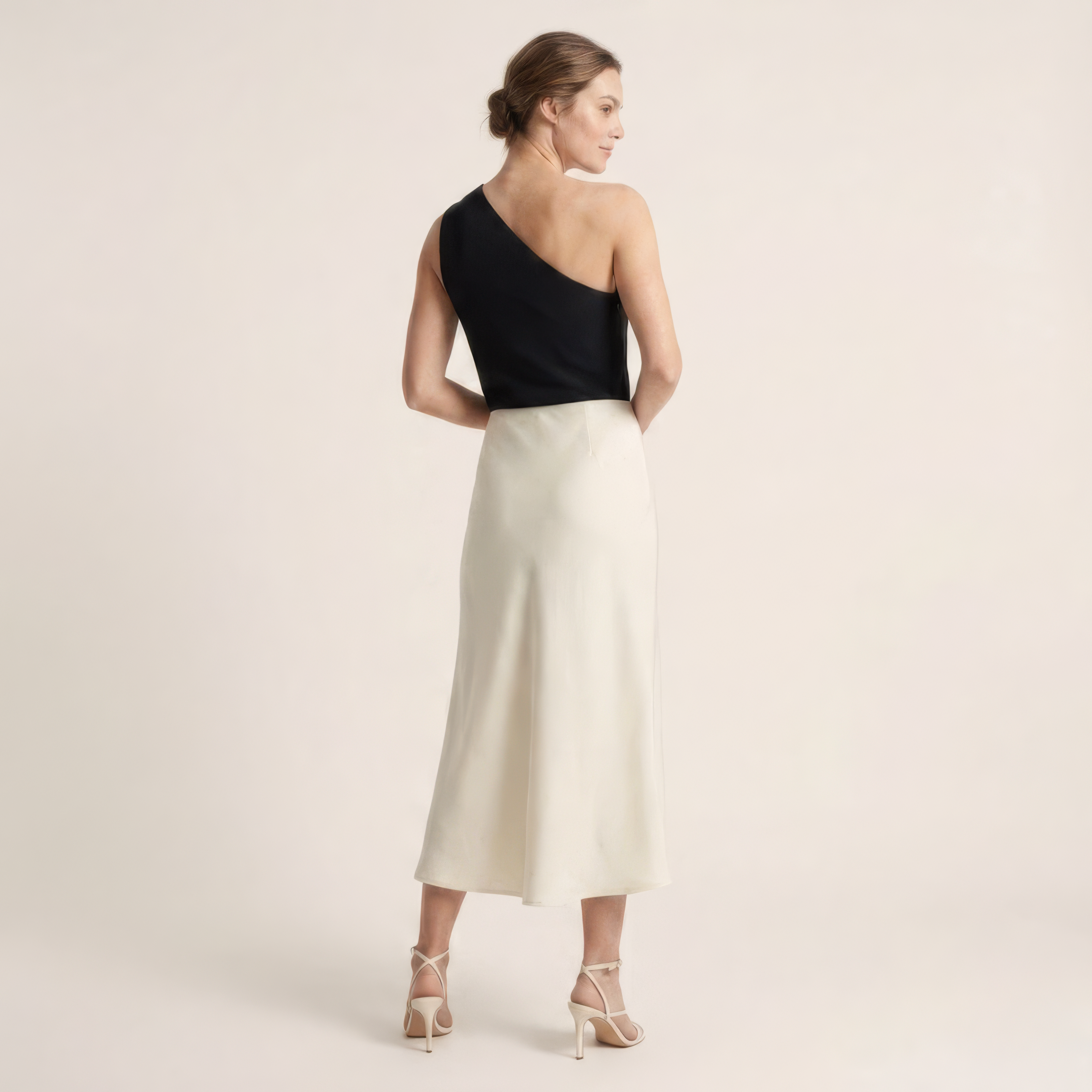 Women's satin skirt showcasing the flowing silhouette